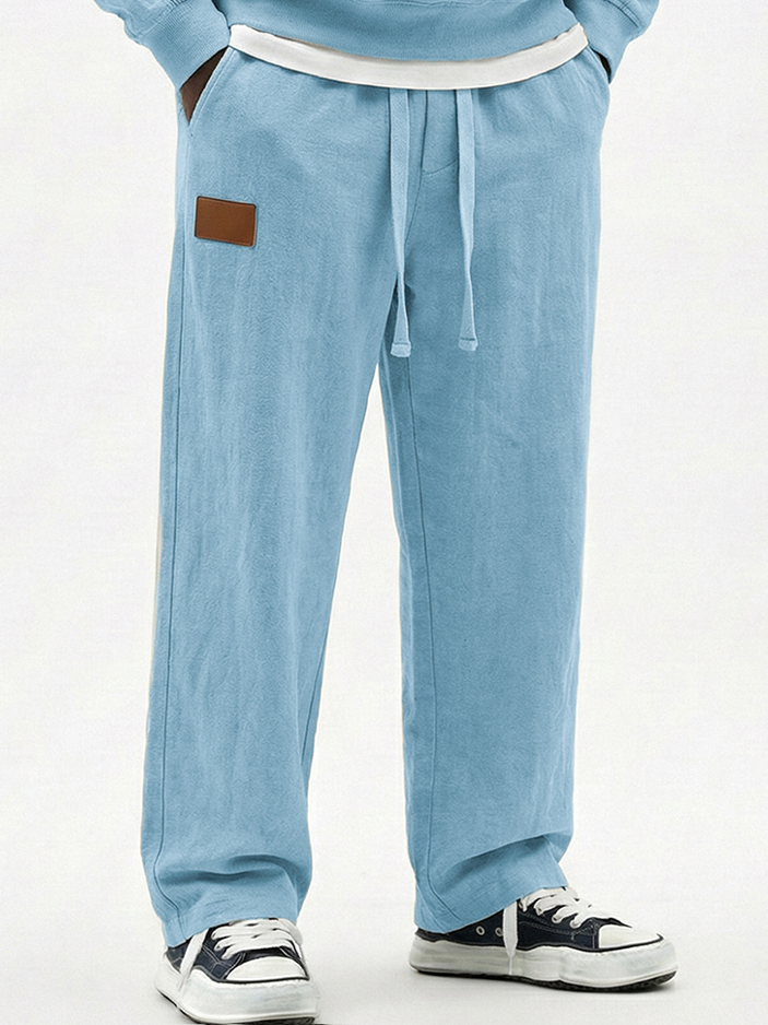 Men's Breathable Cotton-linen Textured Pants with Leather Embroidery Patchwork