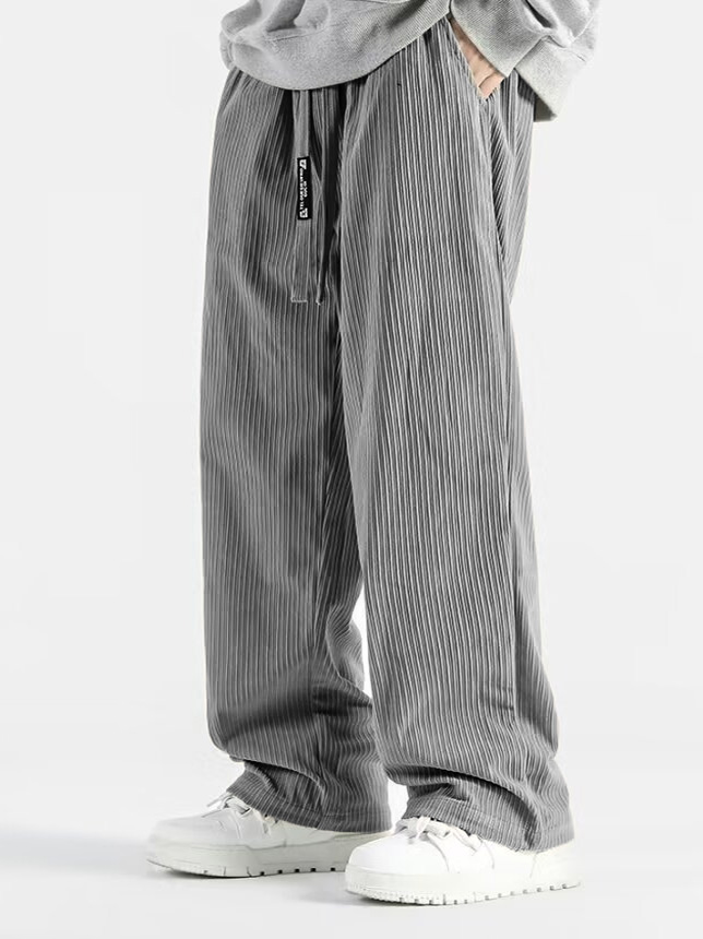 Men's Stylish Casual Loose-fitting Textured Fabric Pants With Pockets And Drawstrings And An Elastic Waistband