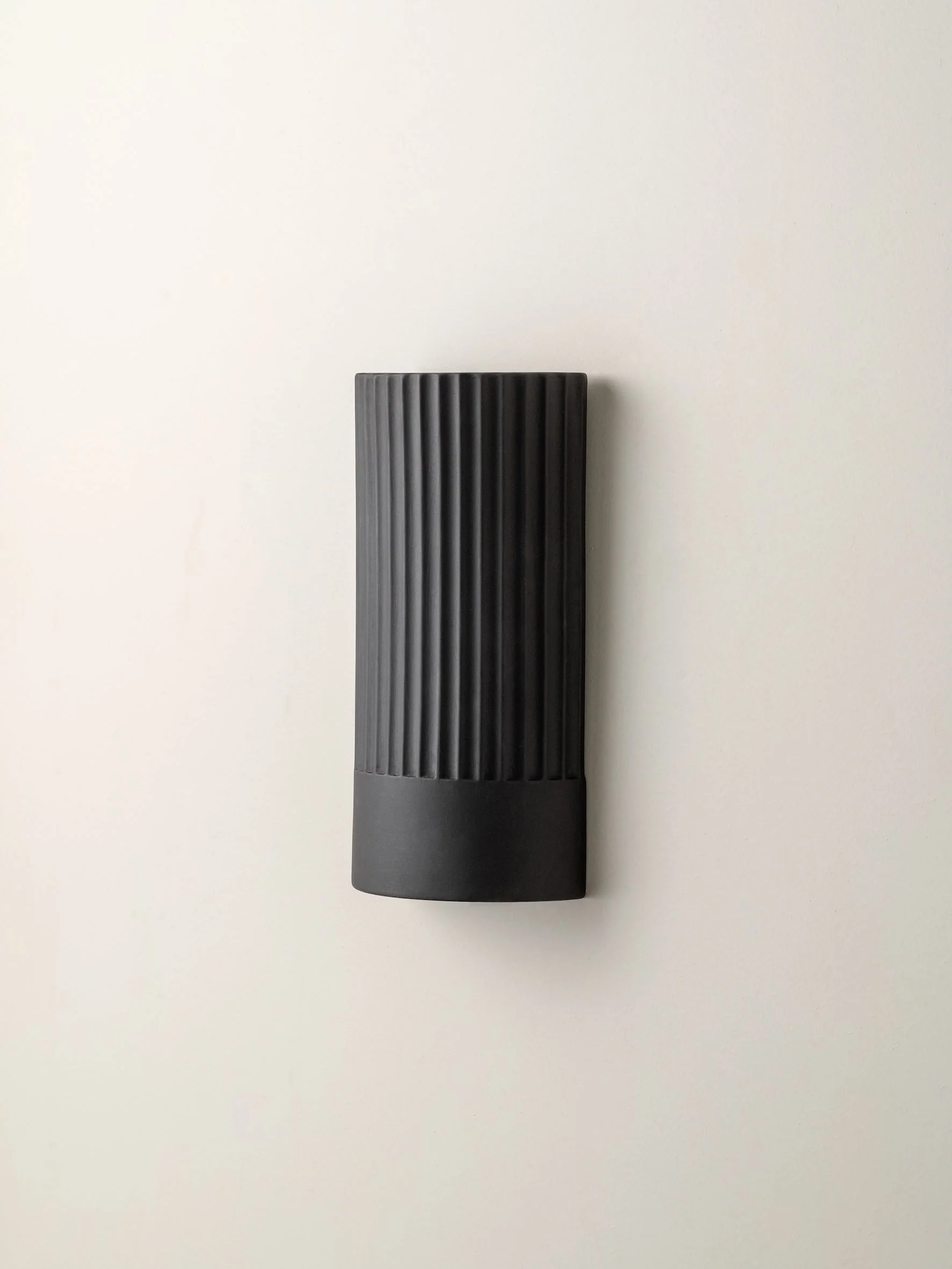chocolate ribbed concrete wall light