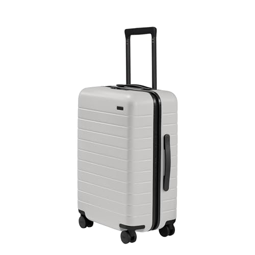 Away Bigger Carry-On Luggage, Lightweight Hardside Large Suitcase with Spinner Wheels, TSA Lock, Airline Approved, Navy Blue