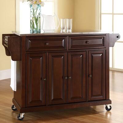 Haslingden Kitchen Island with Stainless Steel Top Three Posts Base Finish: Vintage Mahogany