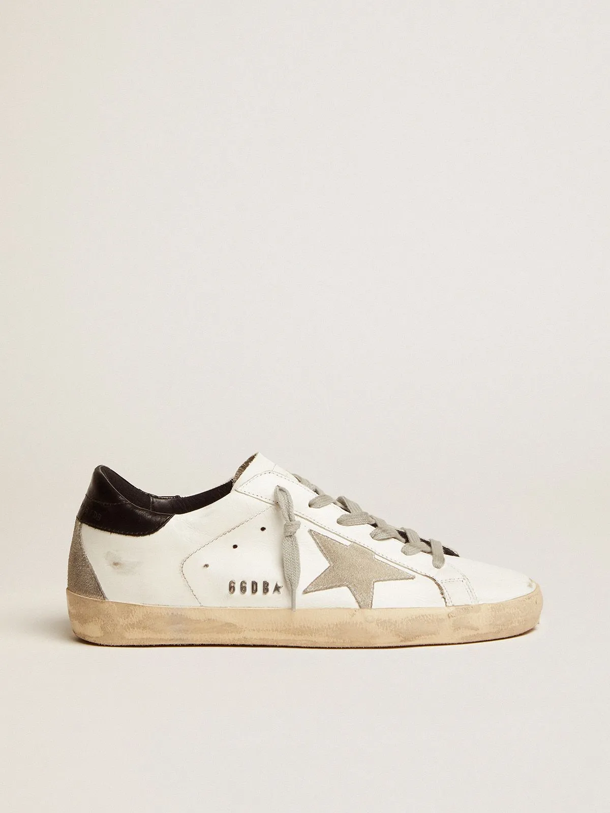 Super-Star sneakers with black heel tab and metal stud lettering