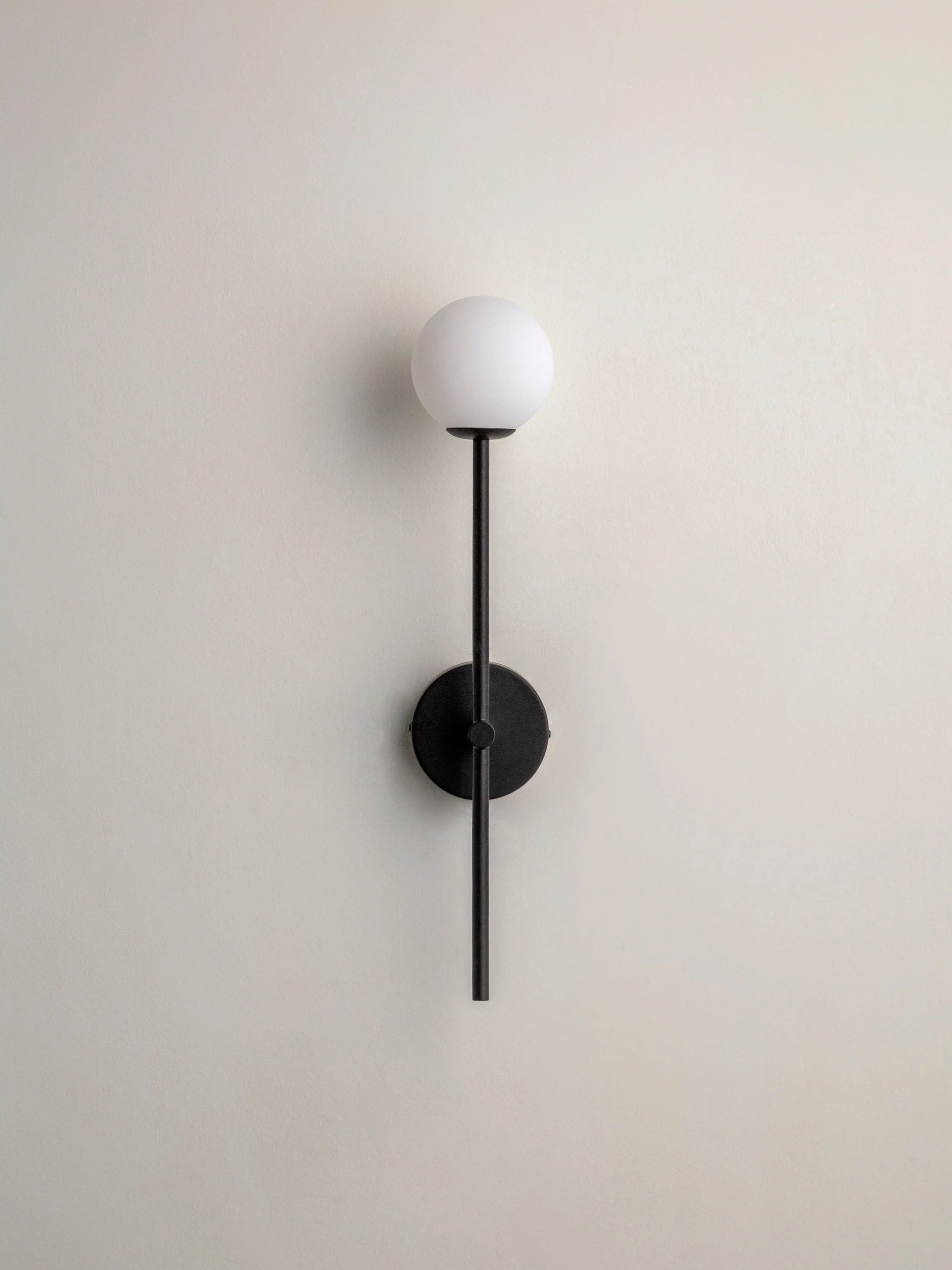 matt black and opal wall light