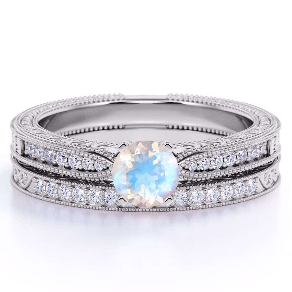 JeenMata 1.75 Carat Round Cut Moonstone and Moissanite Wedding Ring Set with Milgrains in 18k White Gold over Silver