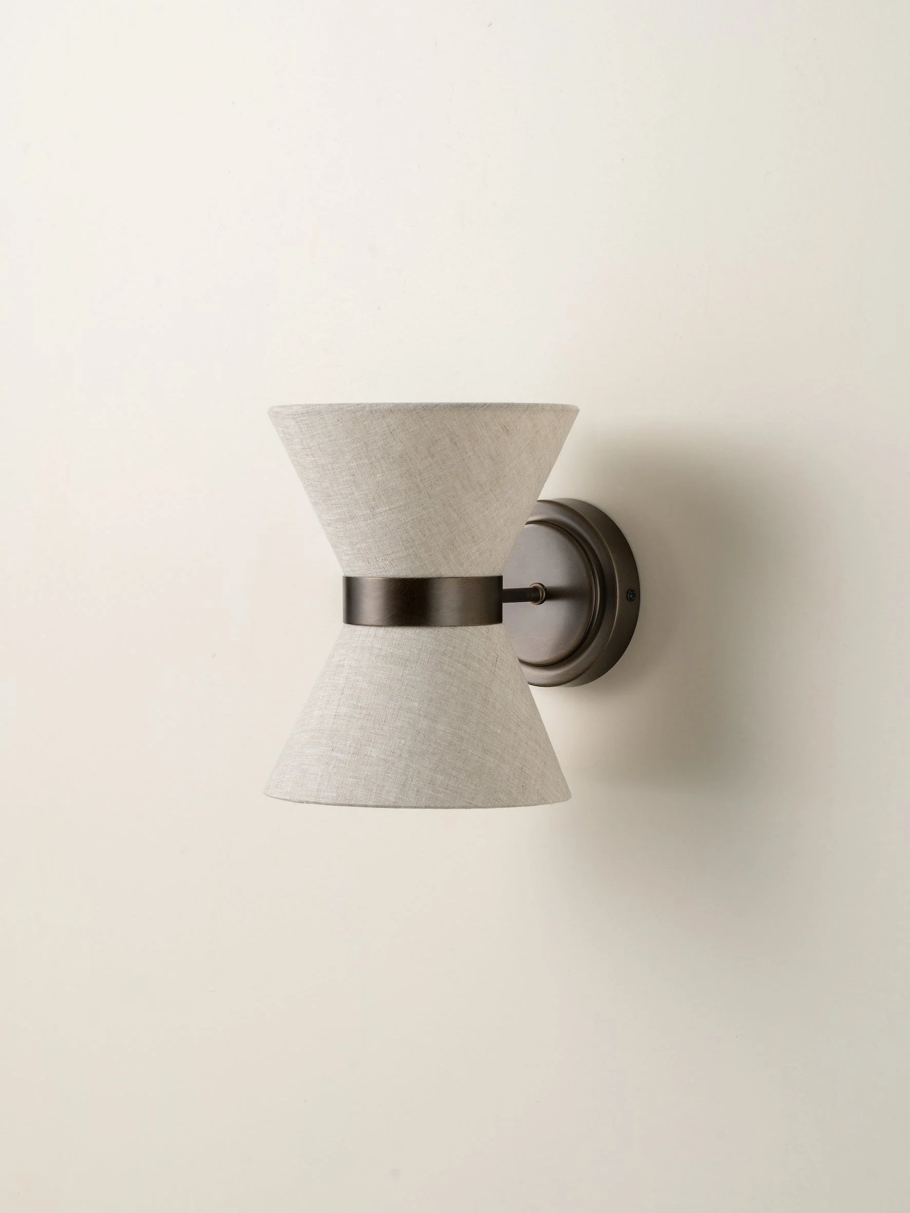 linen and bronze wall light