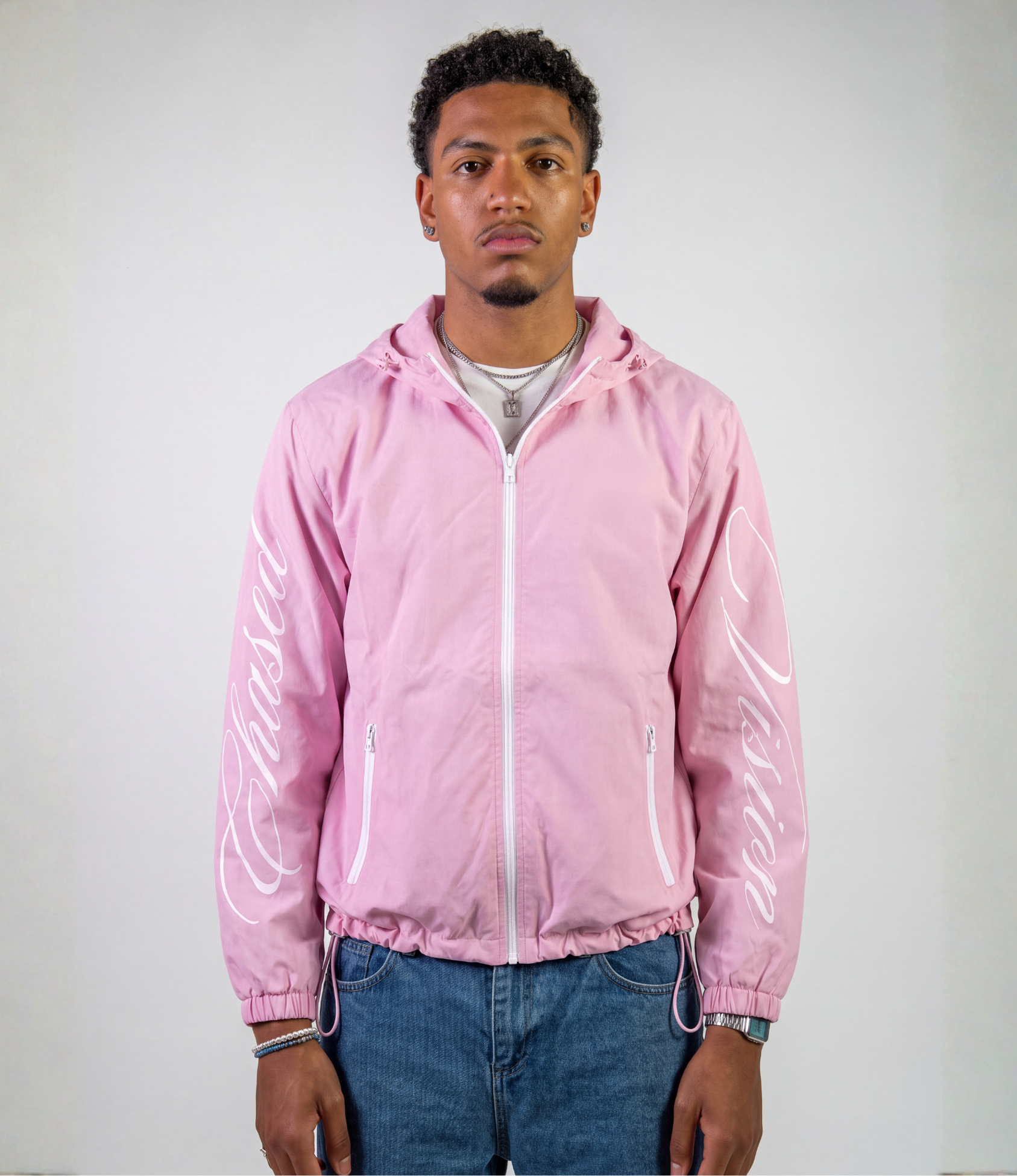 Male model wearing pink 3-in-1 windbreaker jacket