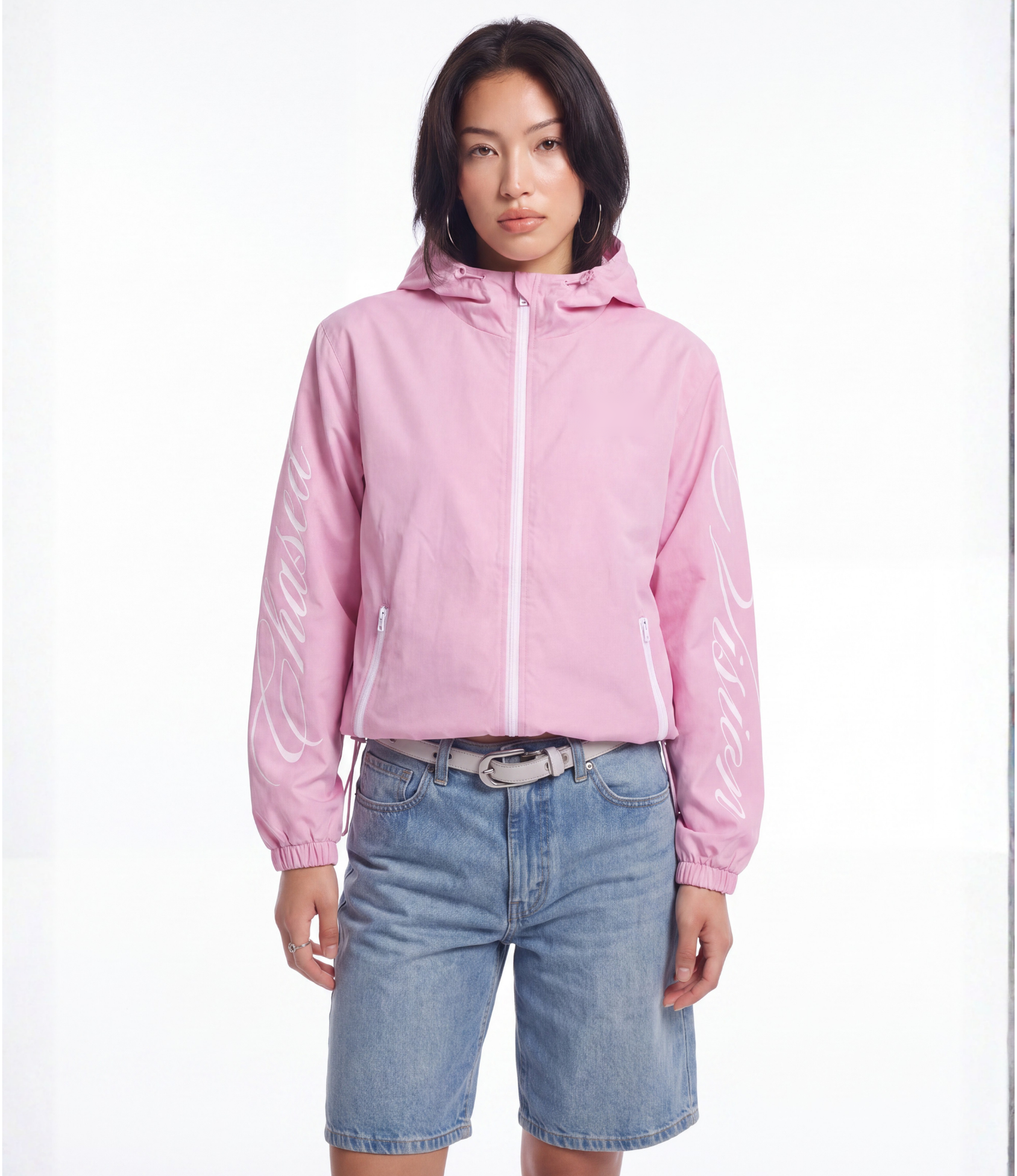 Female model wearing pink 3-in-1 windbreaker jacket