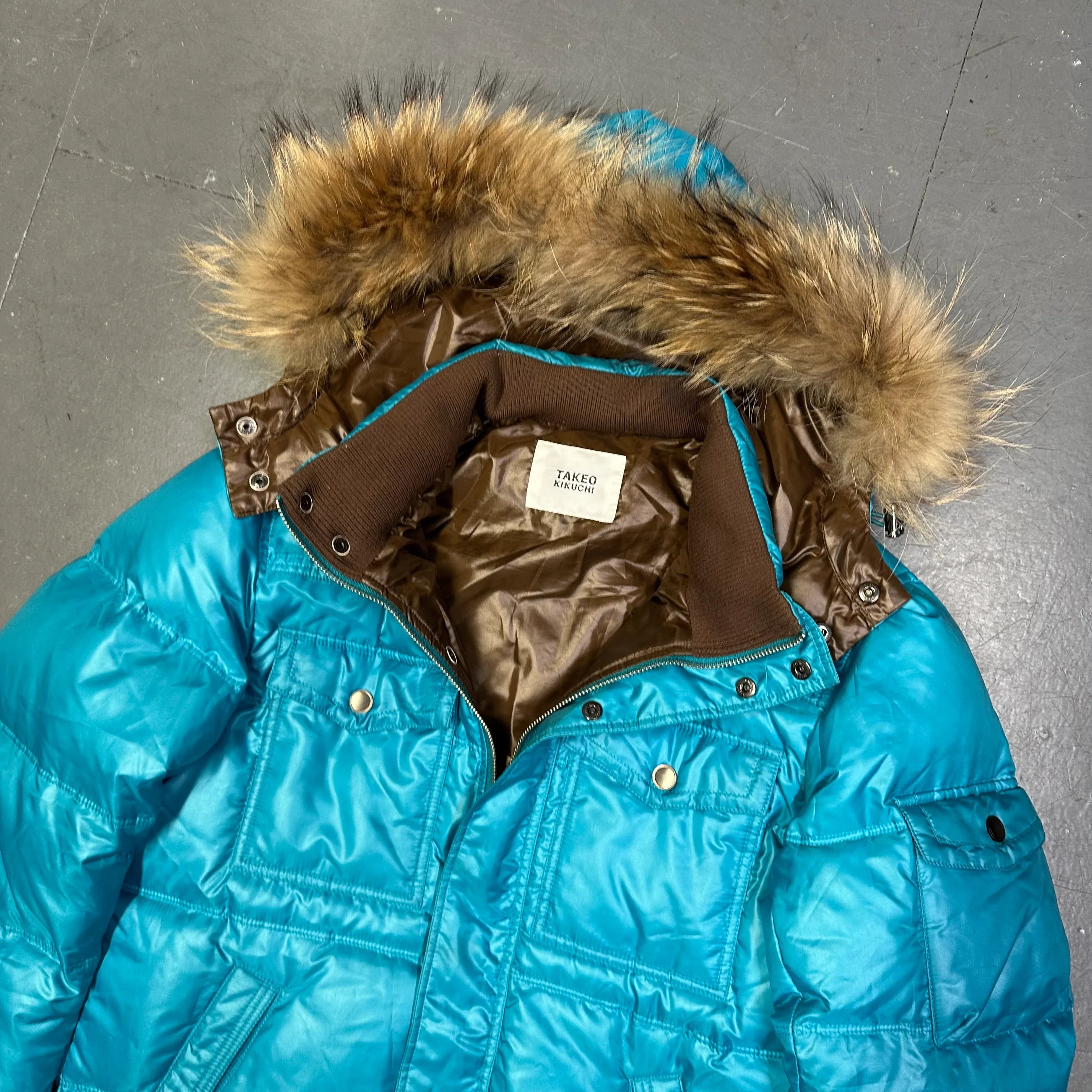 Puffer Jacket With Fur Hood In Blue - product image