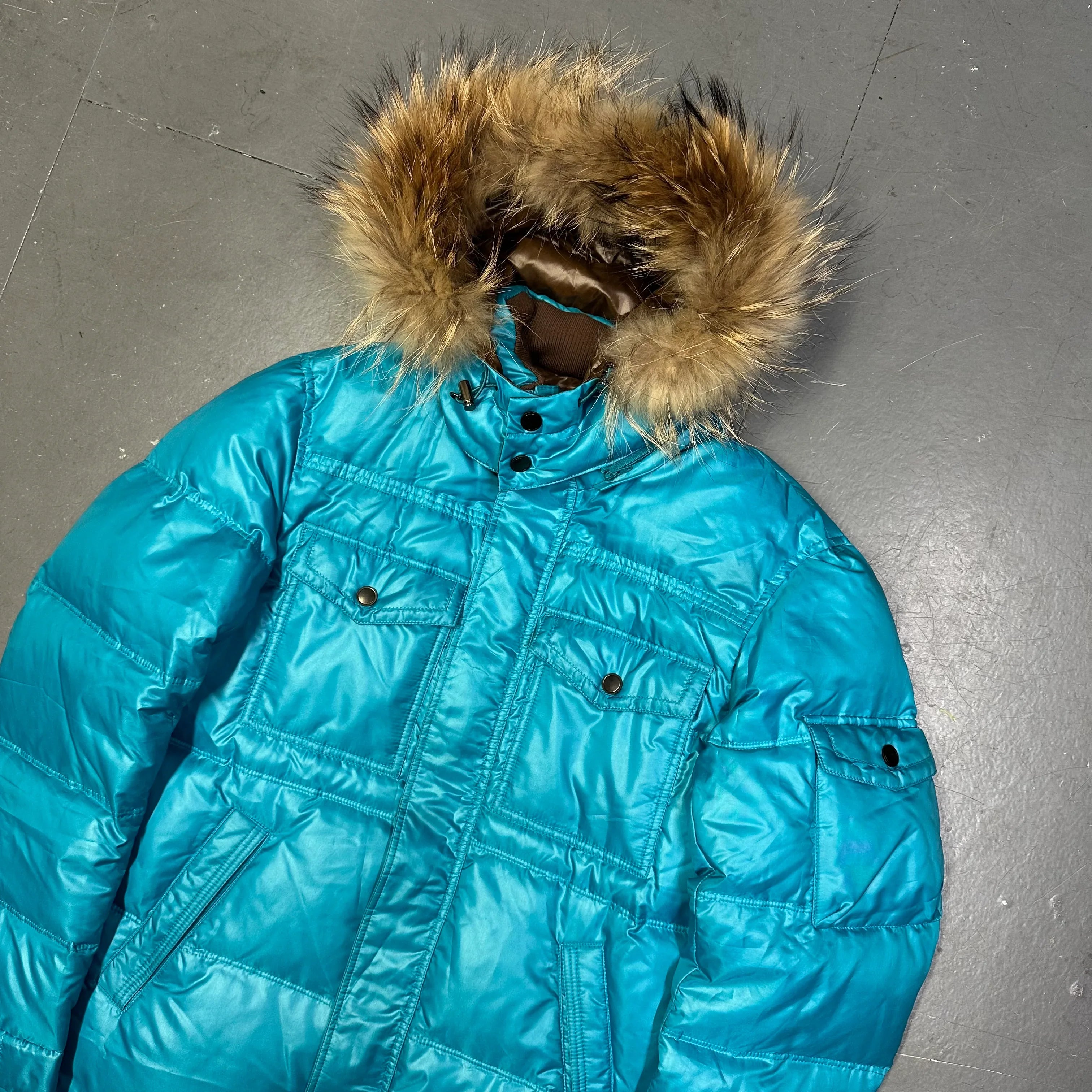 Puffer Jacket With Fur Hood In Blue - product image
