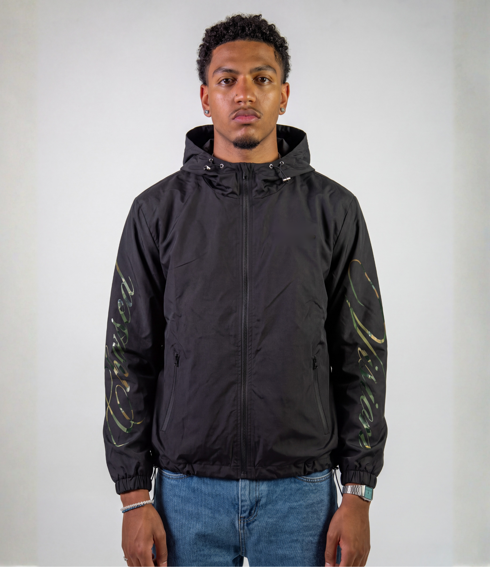 Male model wearing black camo 3-in-1 windbreaker jacket
