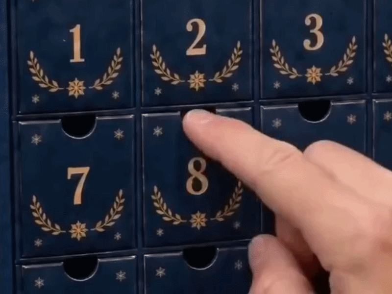 Suggested image: before-and-after comparison showing an ordinary emptied Advent calendar versus a growing display of collectible Highland Cow characters