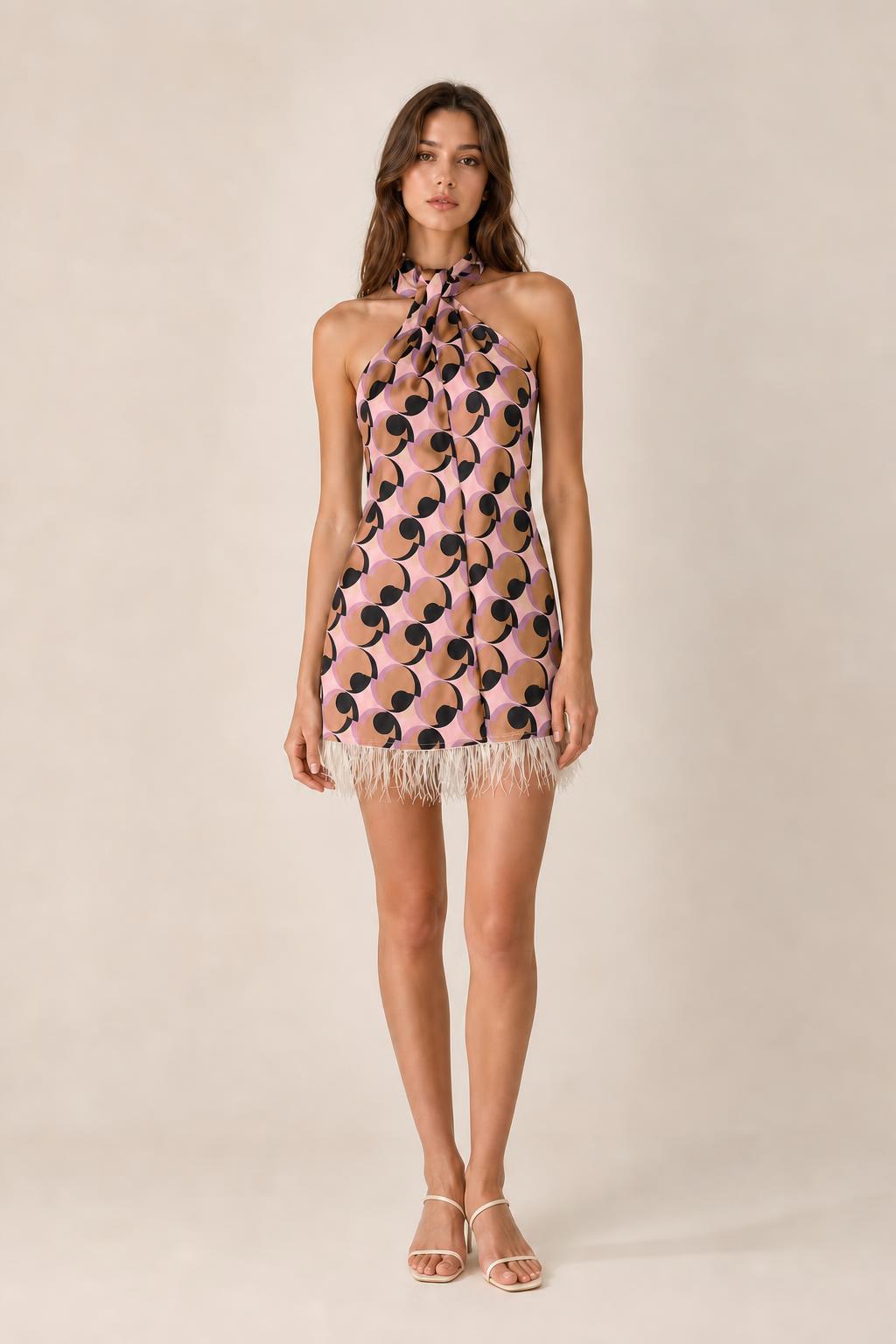 Front view of pink color variant geometric halter mini dress