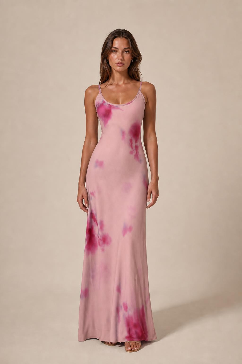 Model wearing pink tie-dye cami slip maxi dress