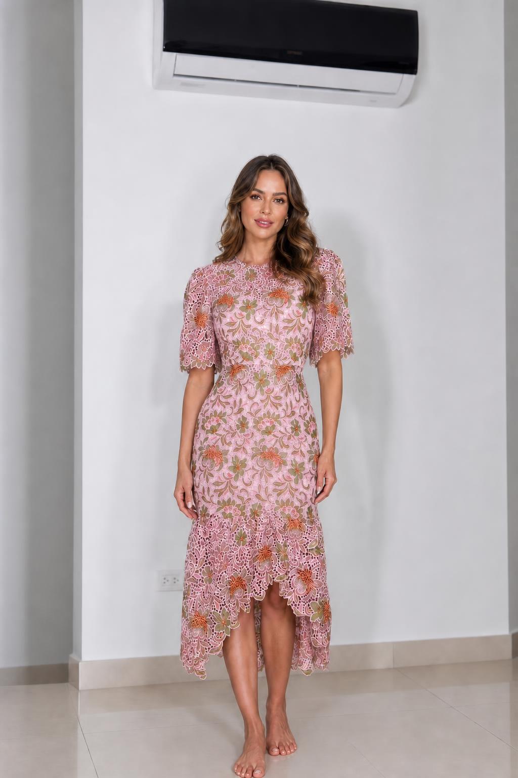 Front view of pink floral lace midi dress