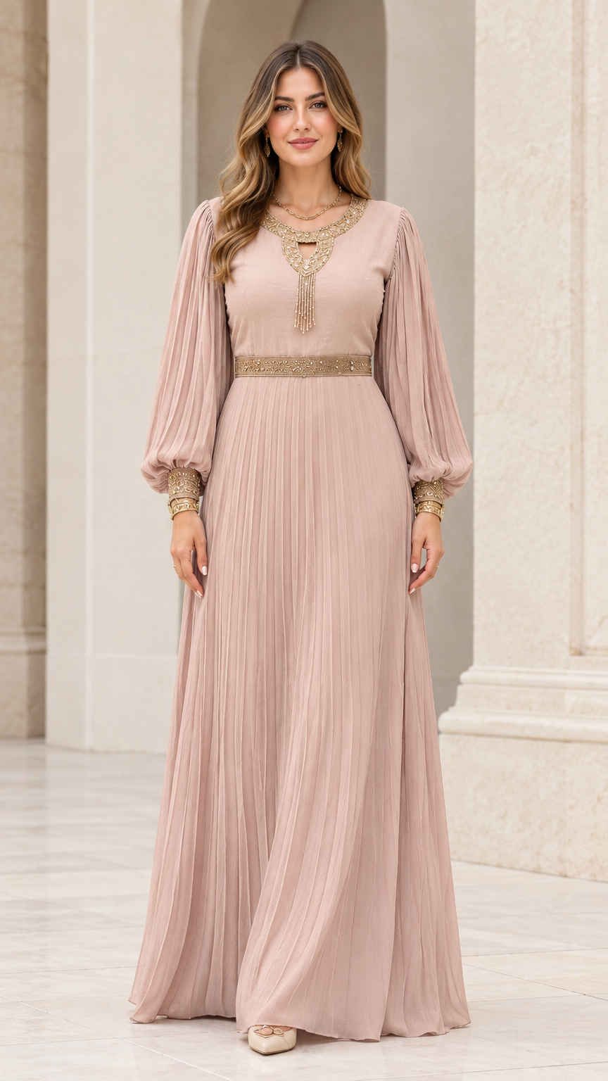Full front view of model wearing dusty rose pleated long sleeve maxi dress with gold embroidery