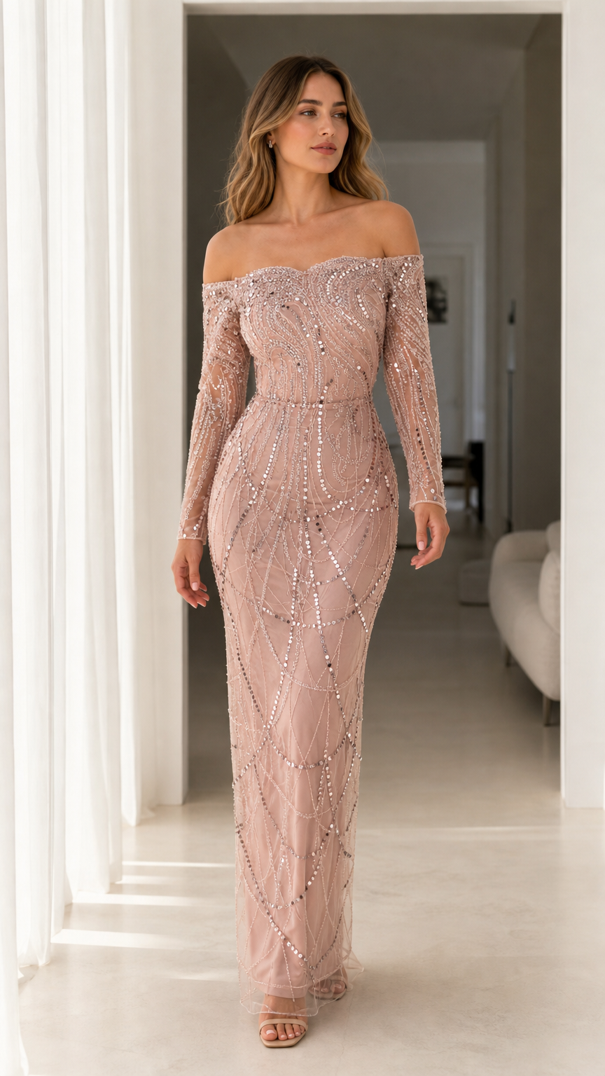 Front view of woman wearing dusty rose off-the-shoulder long sleeve sequin maxi evening gown