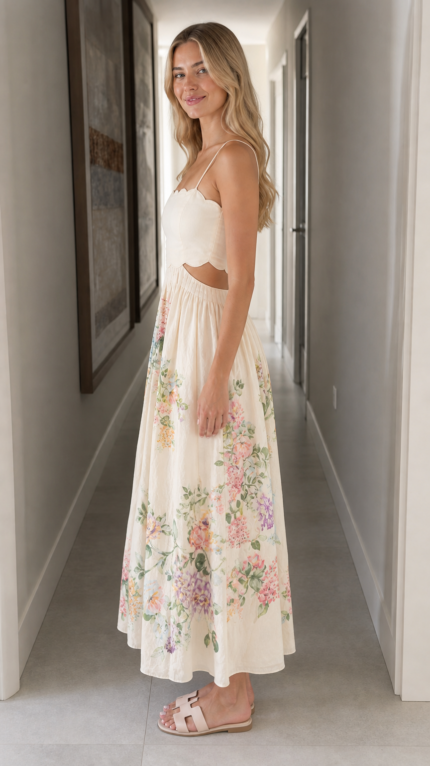 Woman wearing ivory floral cutout midi dress side view