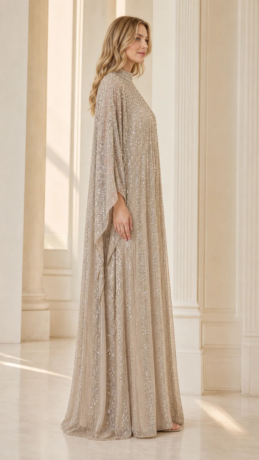 Champagne pleated sequin kaftan evening dress side profile with cape sleeves