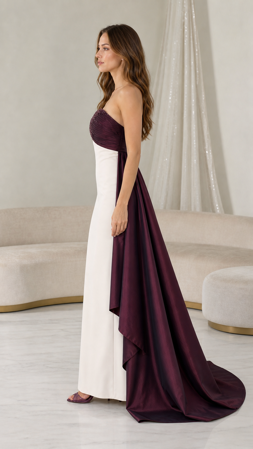 Side profile view of burgundy and white evening gown