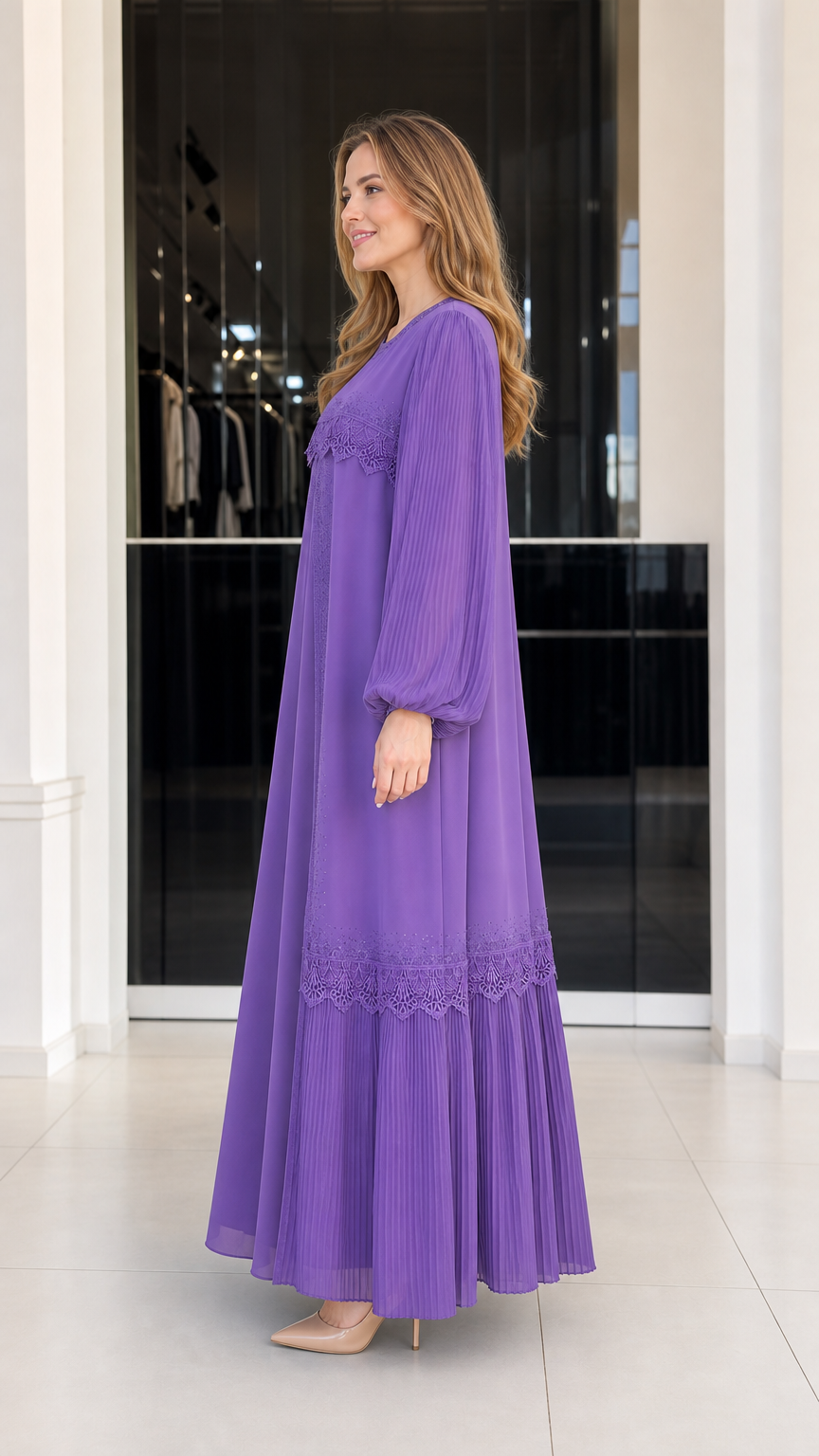 Side profile view of woman wearing purple pleated evening maxi gown