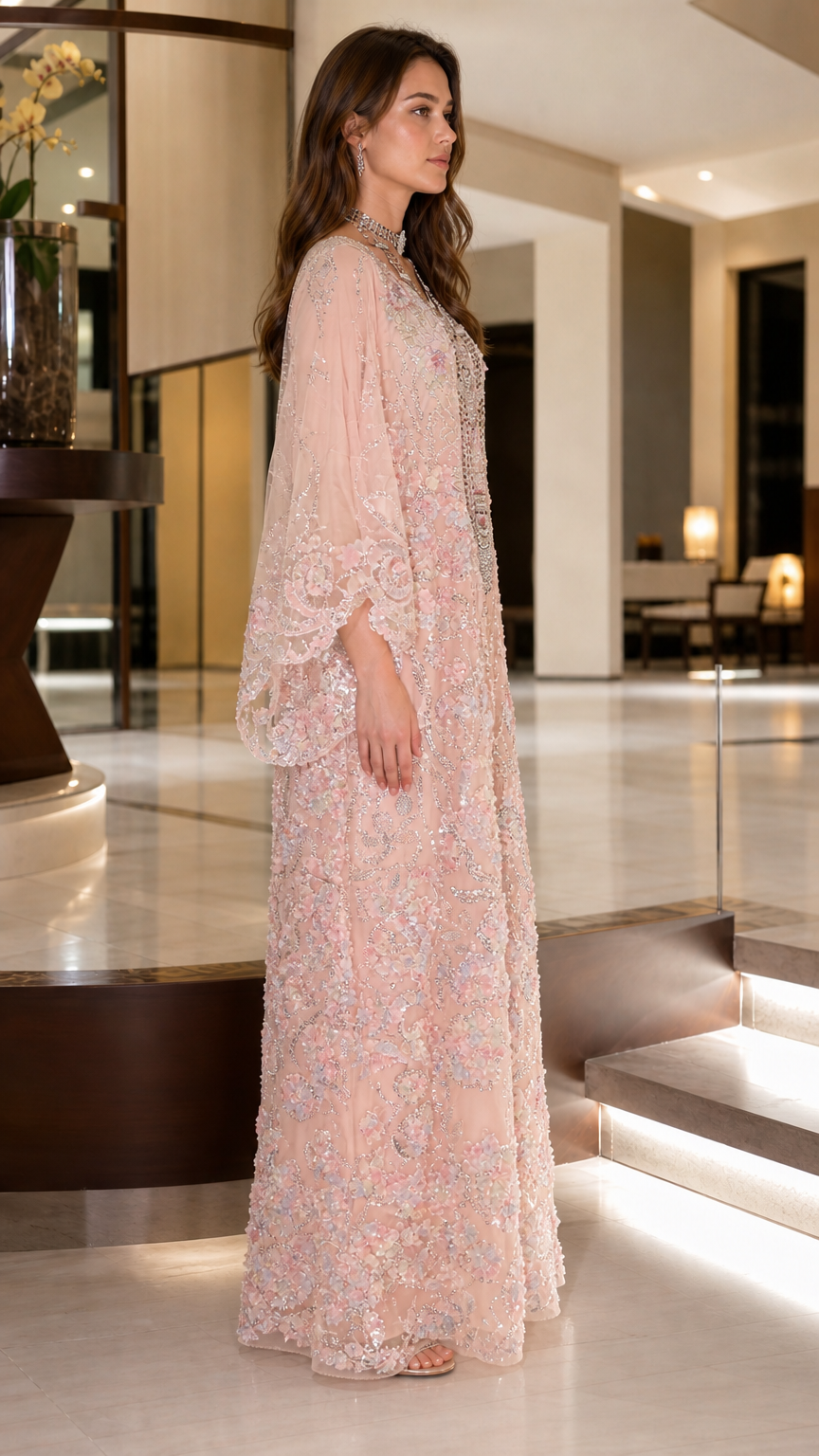Side angle of blush pink floral sequin kaftan maxi dress with wide sleeves