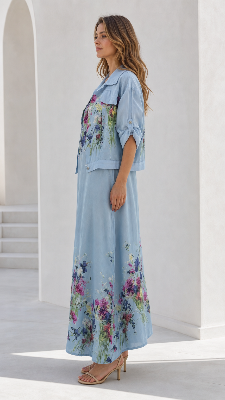 Side profile of sky blue floral two-piece maxi dress set
