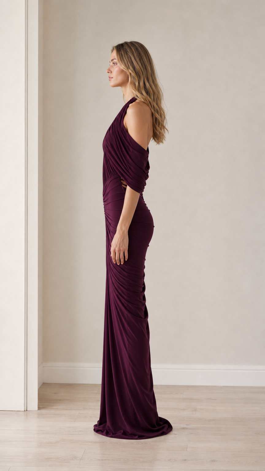 Side profile view of the plum evening gown