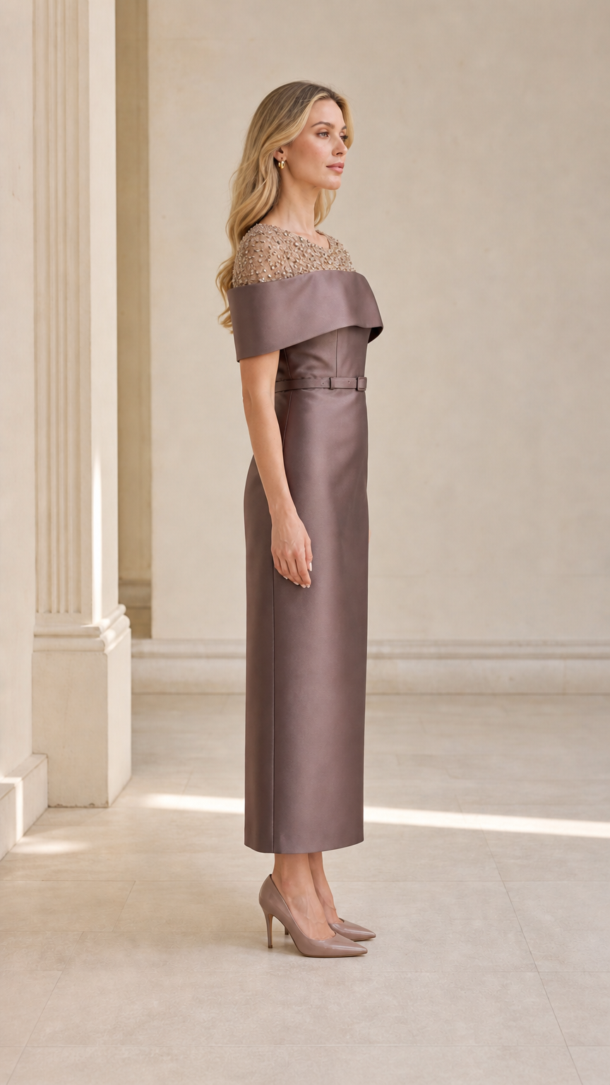Side view of taupe evening dress with belt and midi length