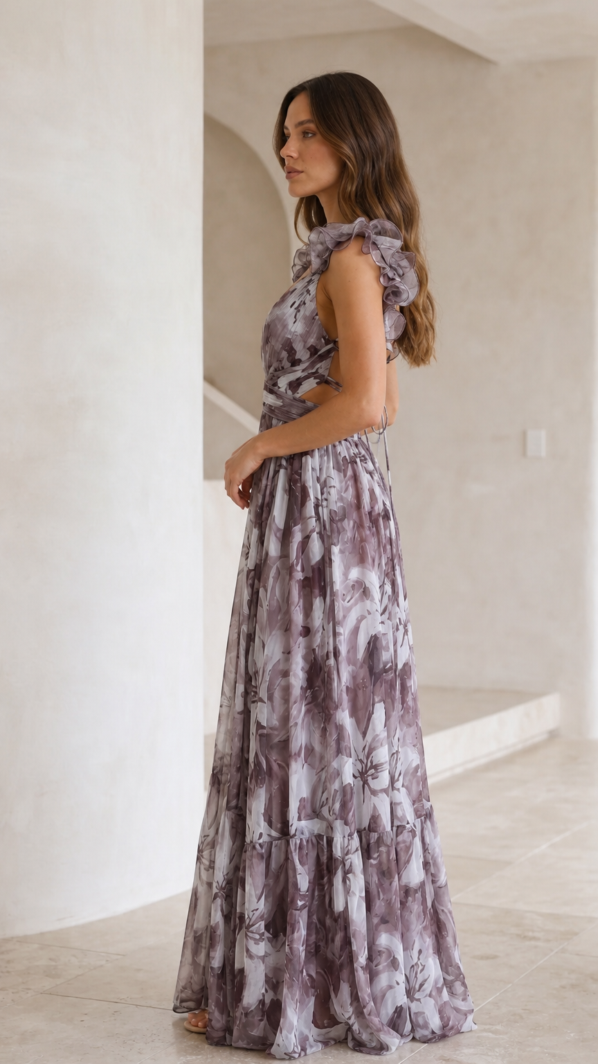Side profile view of dusty purple floral backless maxi dress