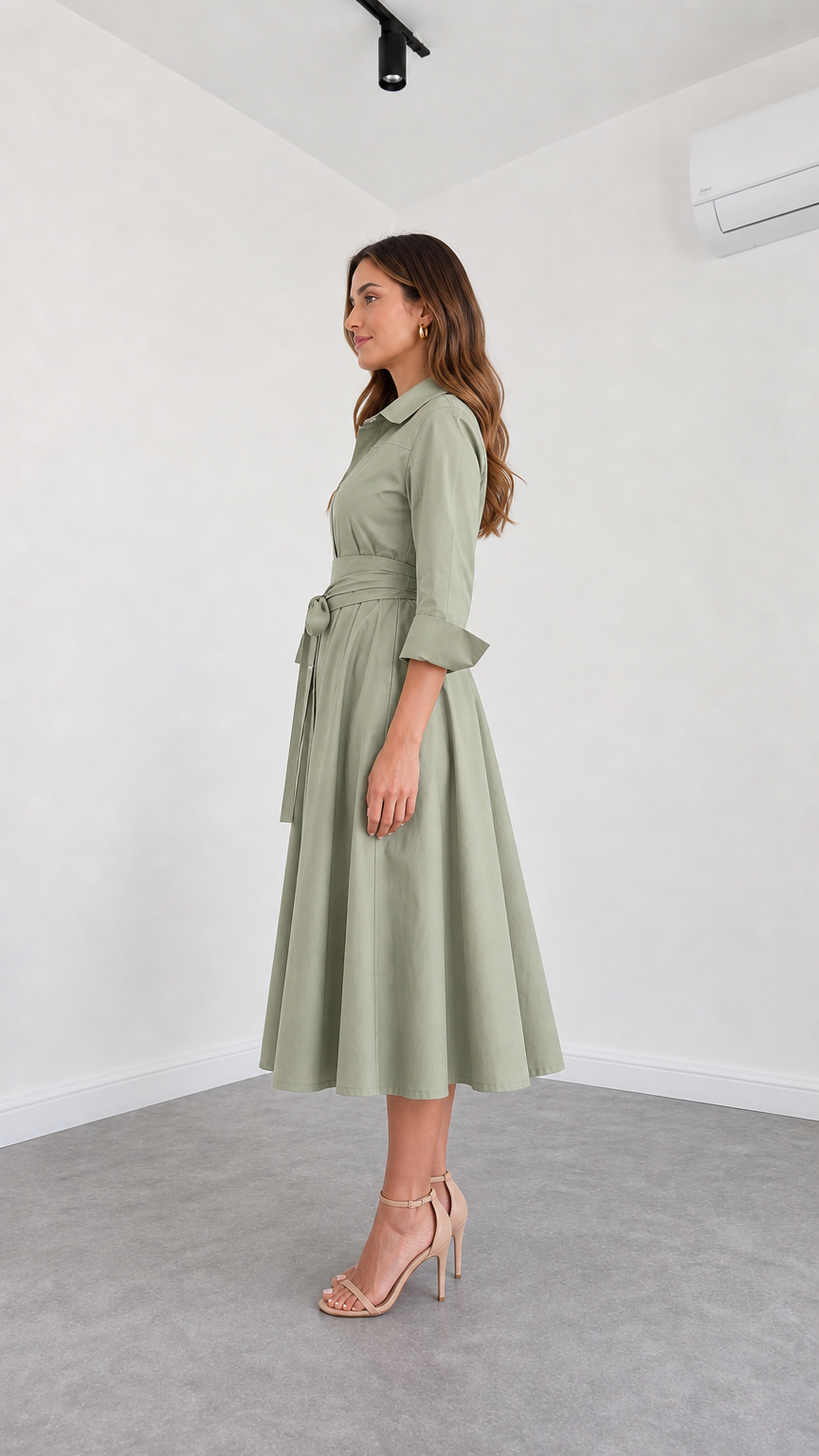 Side profile view of Sage Green collared midi dress with sash belt