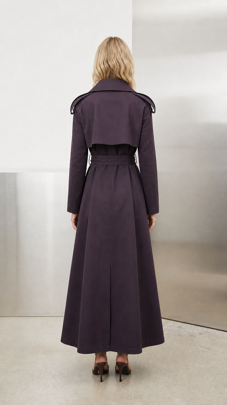 Back view of deep purple maxi trench coat showing back storm flap and vent