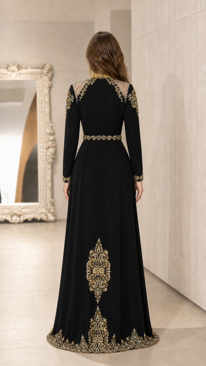 Back view of black long sleeve evening dress with gold embroidery