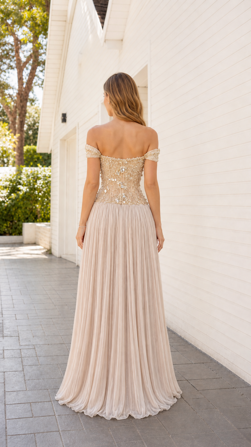 Back view of champagne pleated evening dress