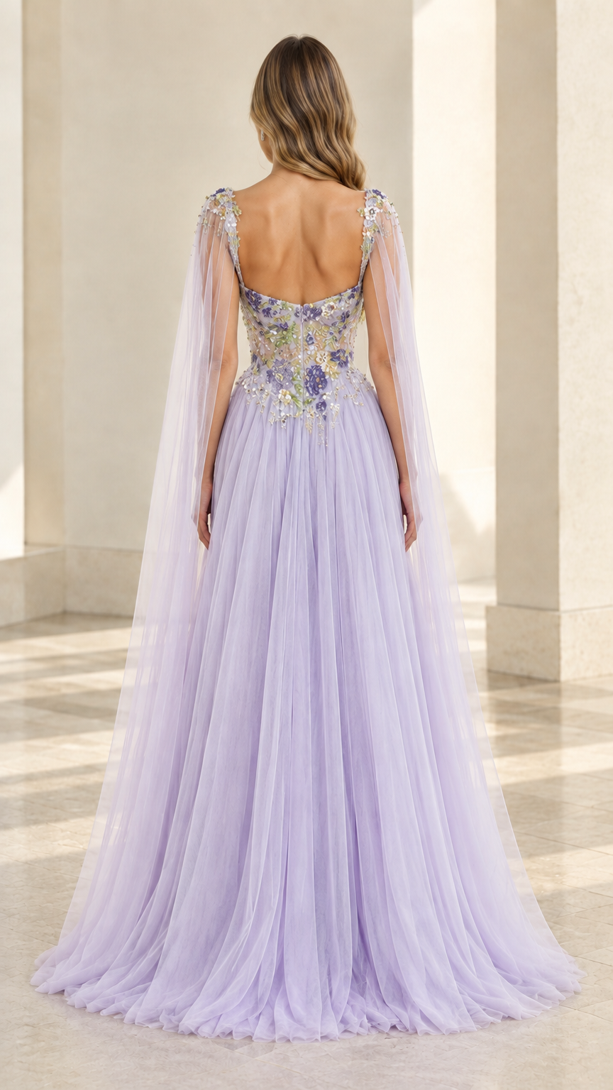 Back view of lavender tulle gown featuring low back and flowing cape train