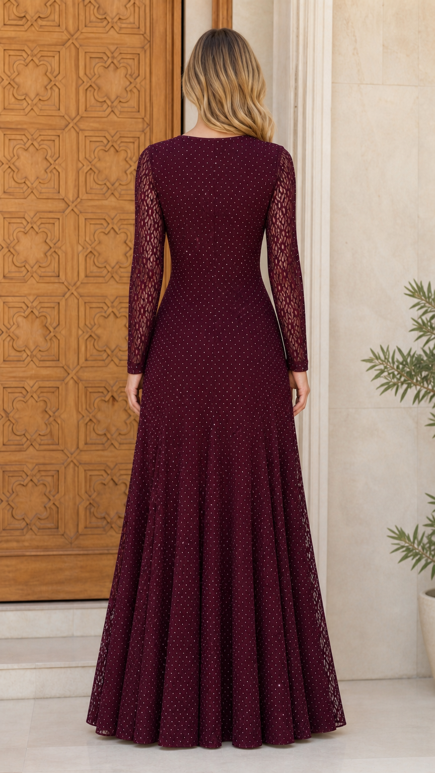 Back view of burgundy floor-length lace evening dress