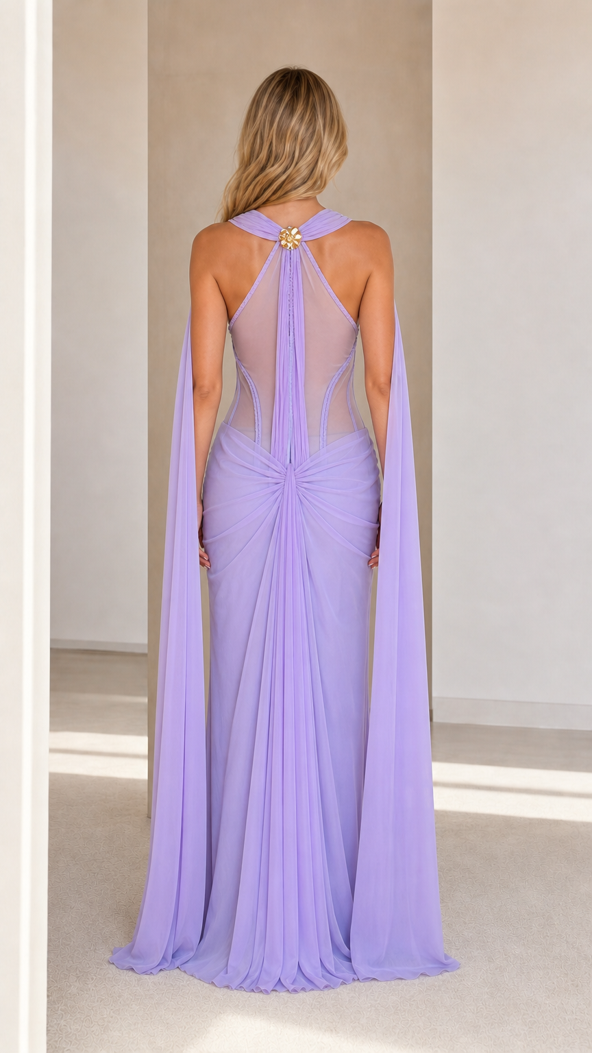 Model wearing lavender cape maxi dress back view showing sheer mesh and capes