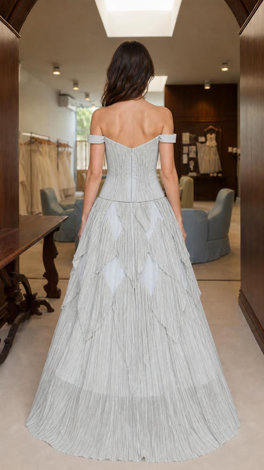 Back view of light grey tiered evening gown
