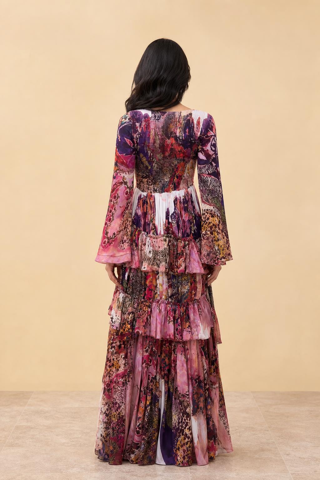 Back view of model showcasing tiered skirt and long sleeves
