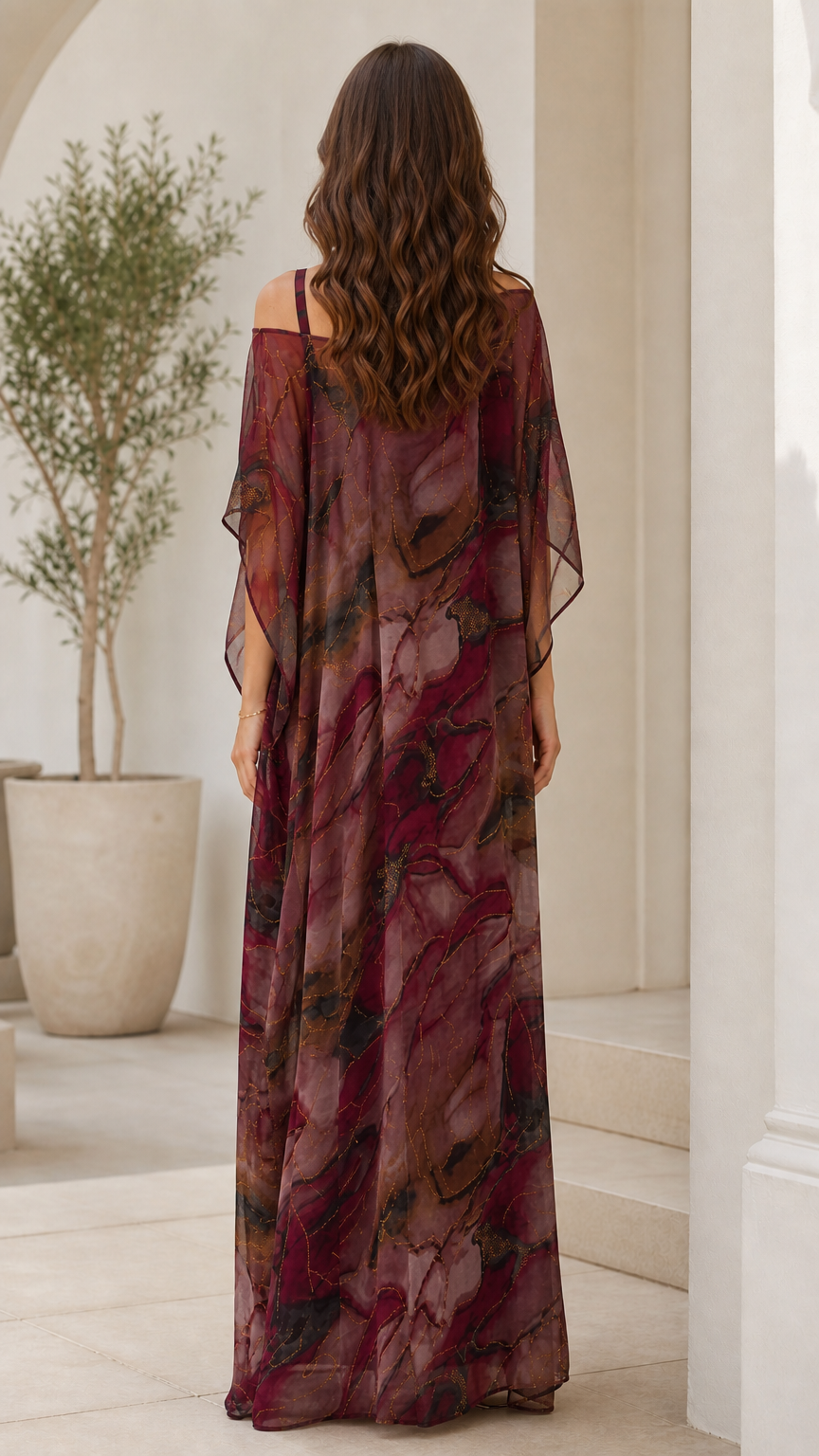 Back view of burgundy sheer overlay draped maxi dress