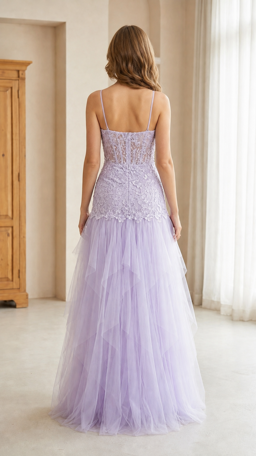 Back view of model in lavender lace corset floor-length gown