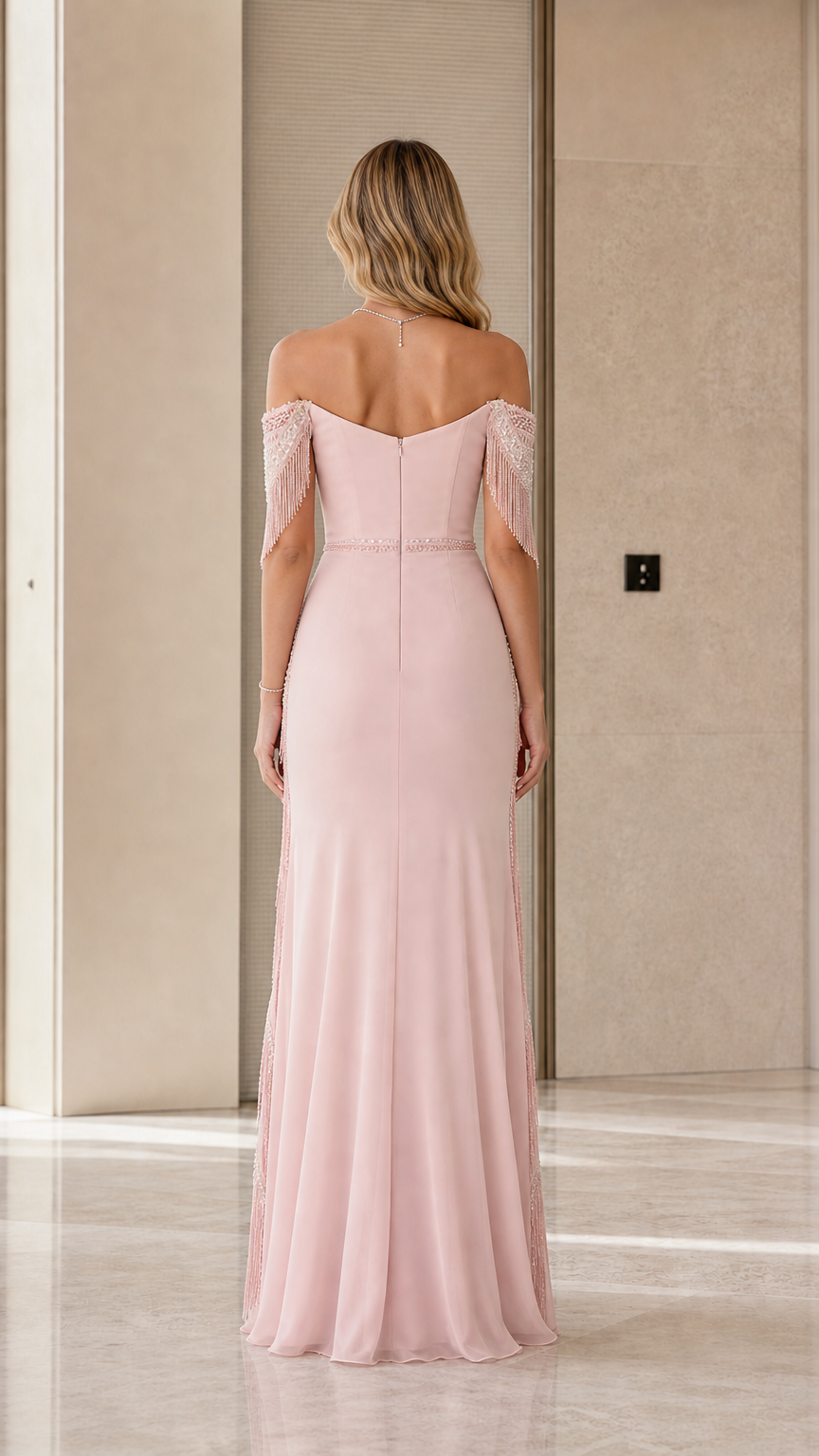 Back view of dusty rose maxi gown showing fitted bodice and flowing hemline