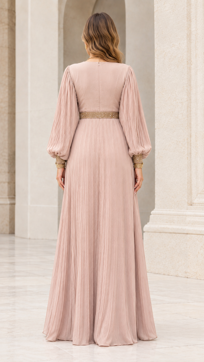 Back view of model in floor-length dusty rose pleated maxi dress