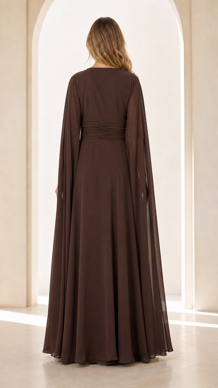 Back view of model wearing Chocolate Brown cape sleeve maxi gown