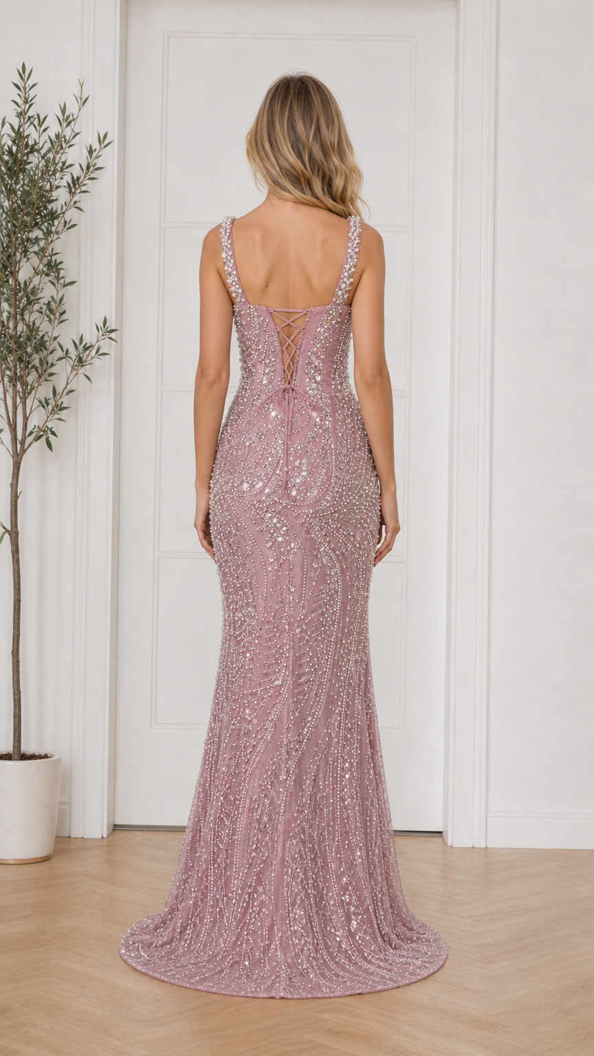 Back view showing lace-up details of dusty pink dress
