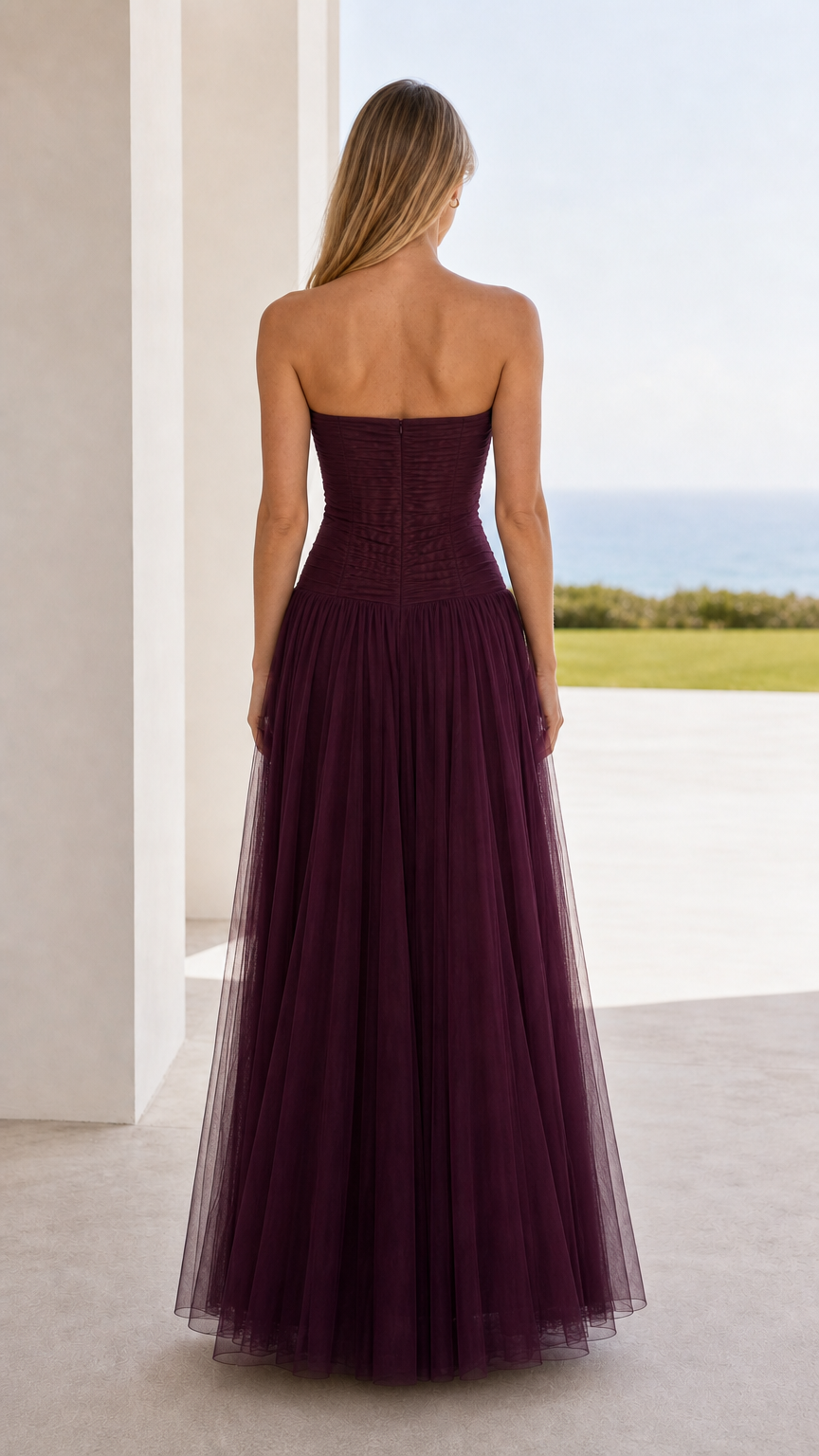 Back view of burgundy strapless ruched tulle maxi dress