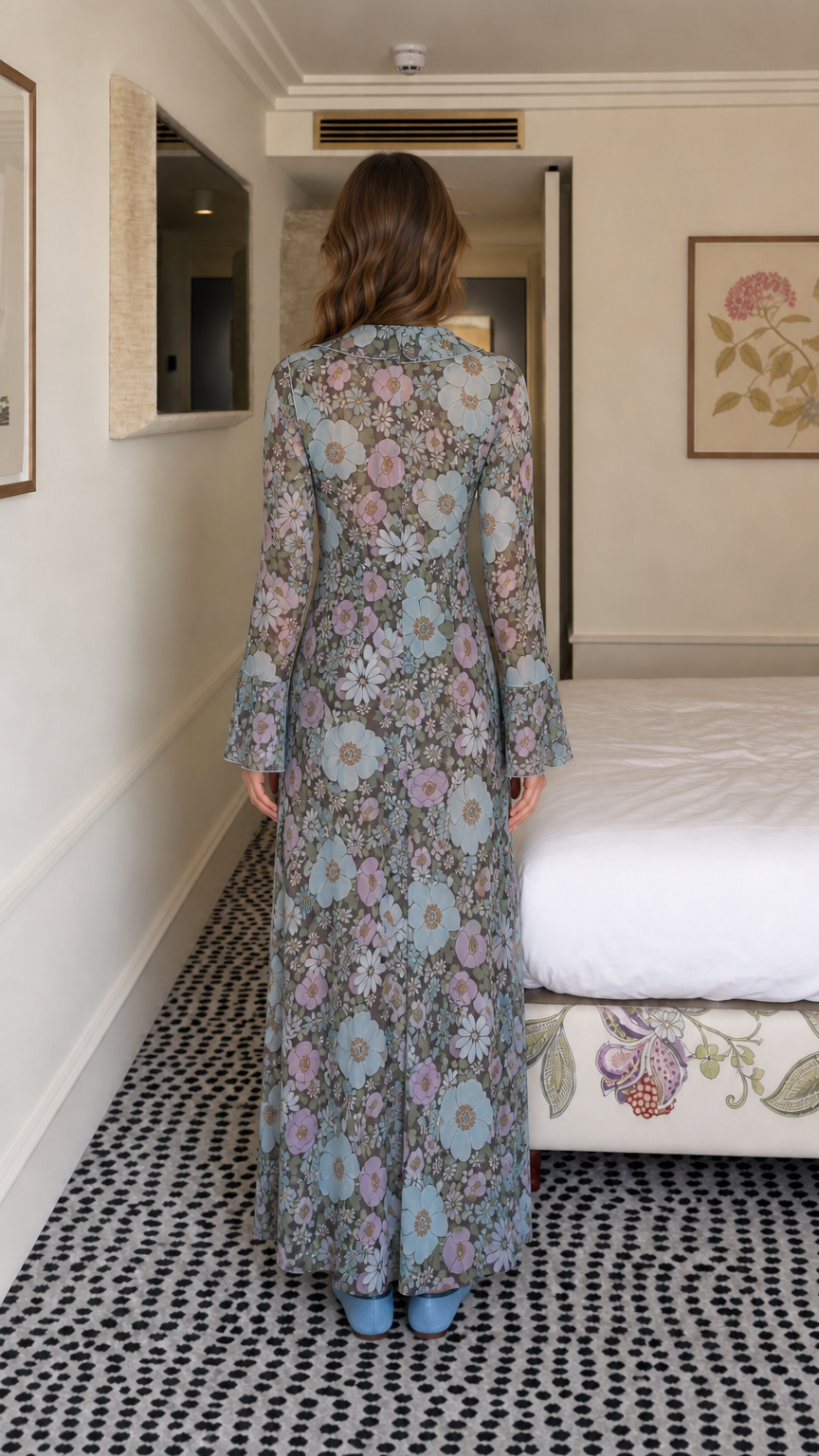 Back view of model in blue floral maxi dress