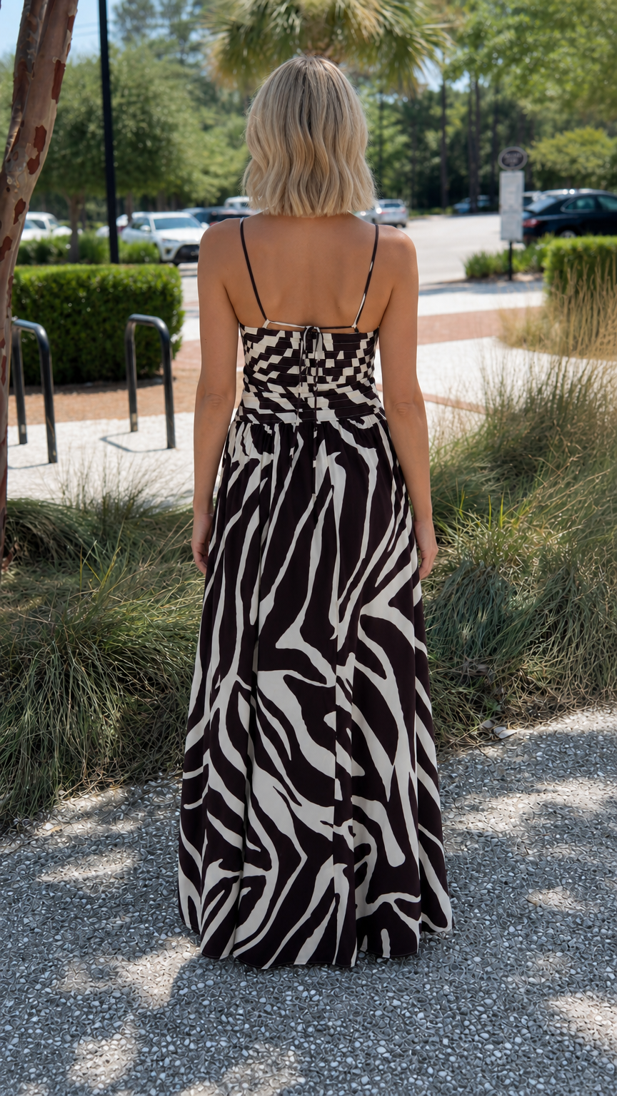 Back view showcasing smocked bodice and tie detail