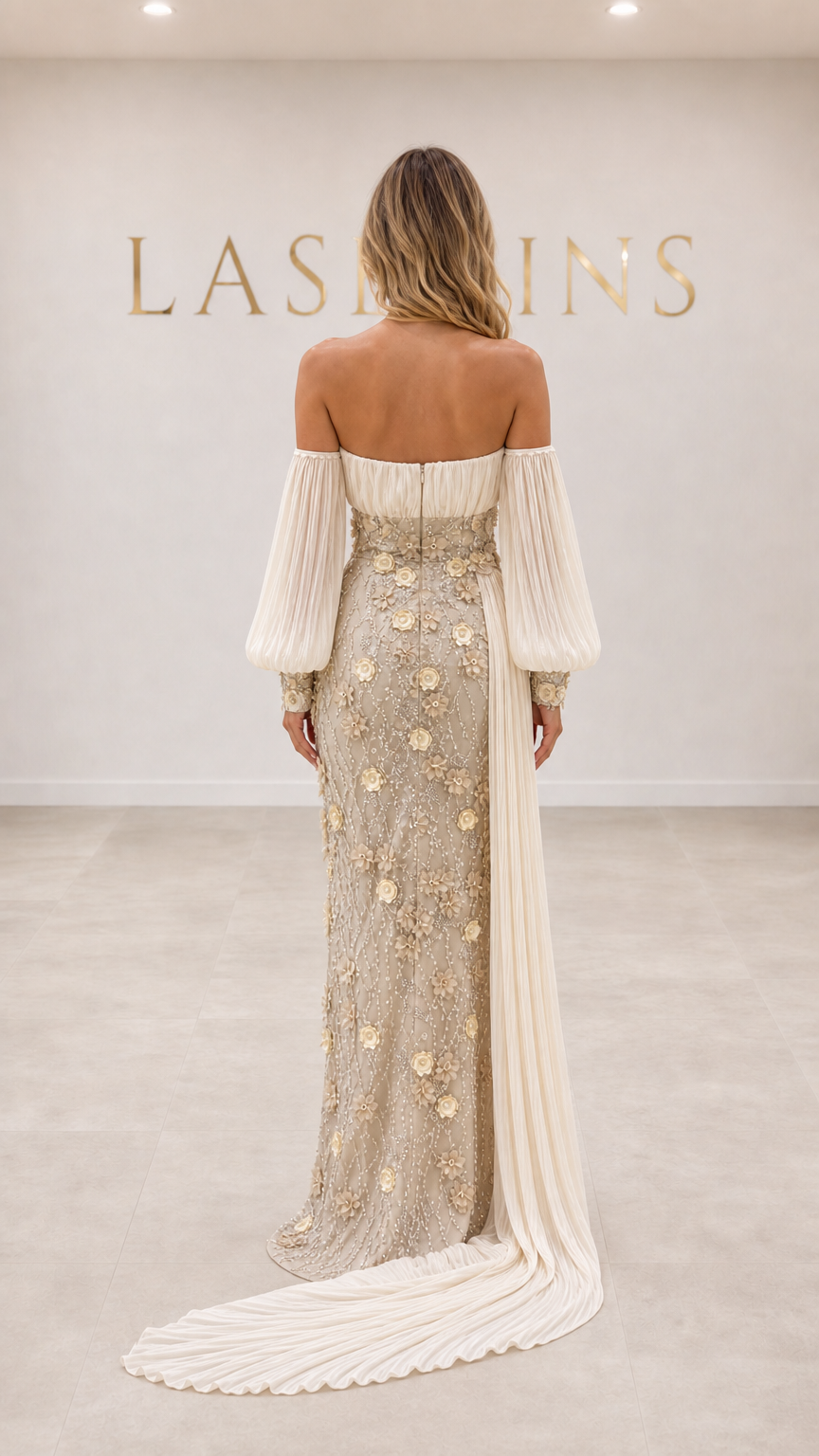 Back view of off-the-shoulder champagne formal evening dress showing train detail