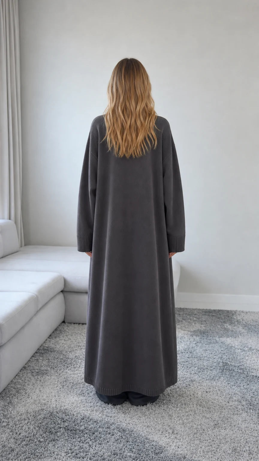 Back view of model wearing a Charcoal Grey full length button down cardigan