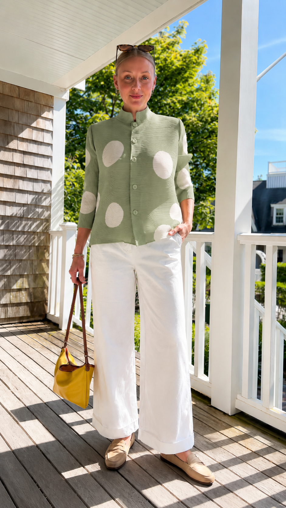 Front view of sage pleated polka dot button-front jacket top with relaxed wide-leg pants